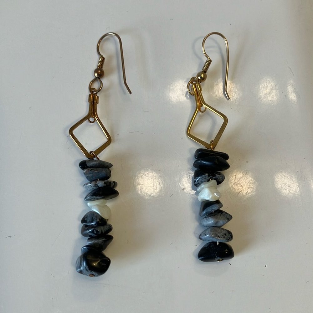 Black and gray semi precious stones with mother of pearl earrings.